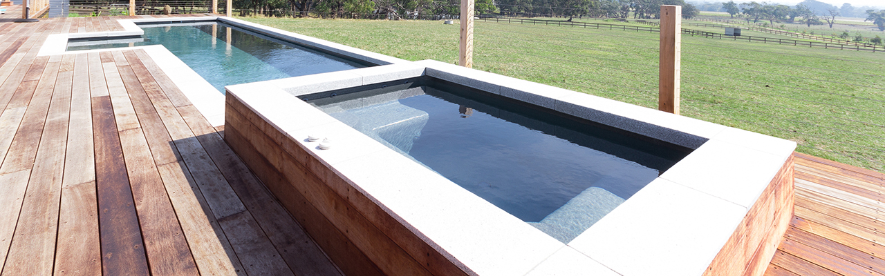 Spa pool and swimming pool by Compass Pools